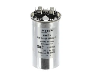 a round silver capacitor with black text