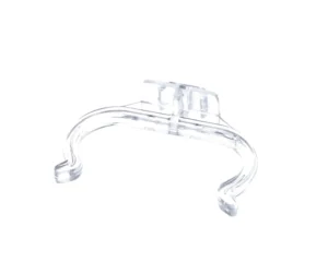 a clear plastic clip on a white background