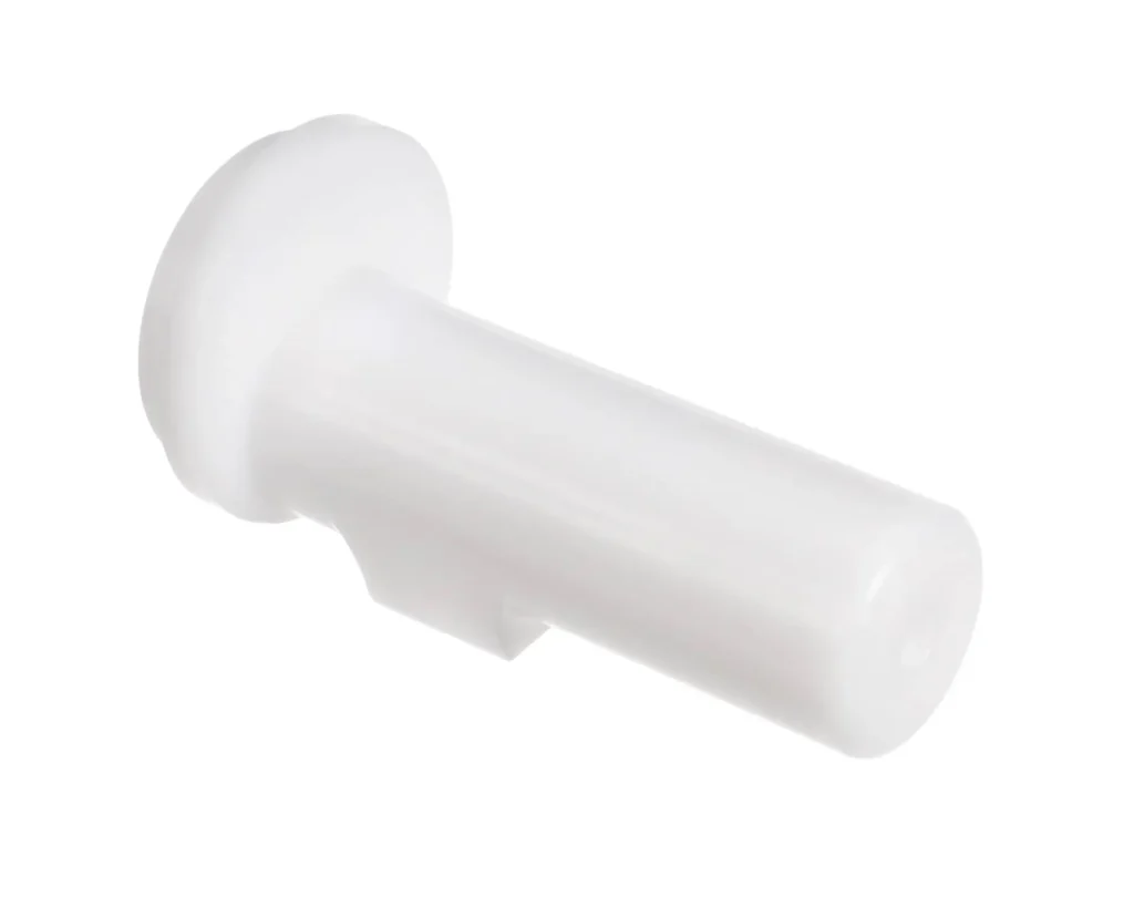 a white plastic object with a round cap