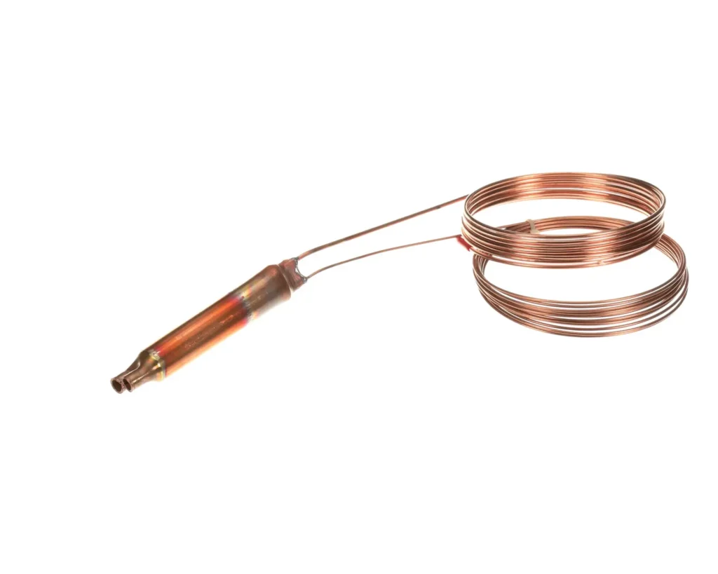 a copper wire on a white background