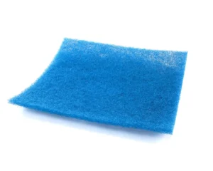 a blue sponge on a white background