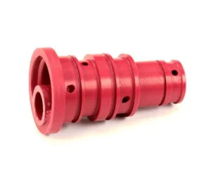 a red plastic cylinder with holes