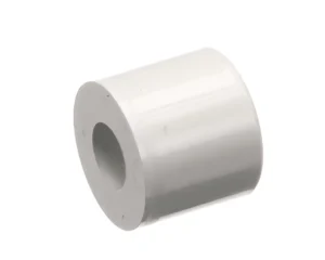 a white plastic pipe with a hole