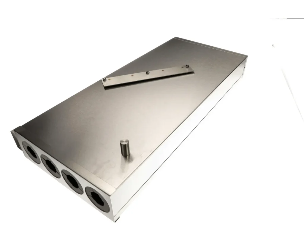 a rectangular metal box with holes and a metal bar