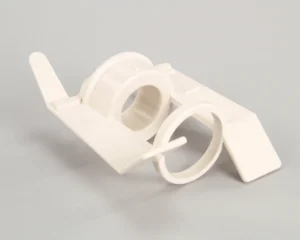 a white plastic tape holder