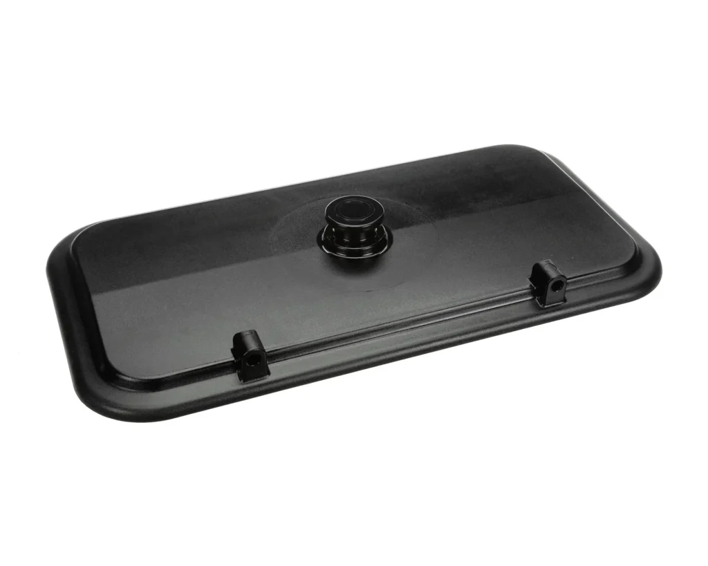 a black rectangular object with a round knob