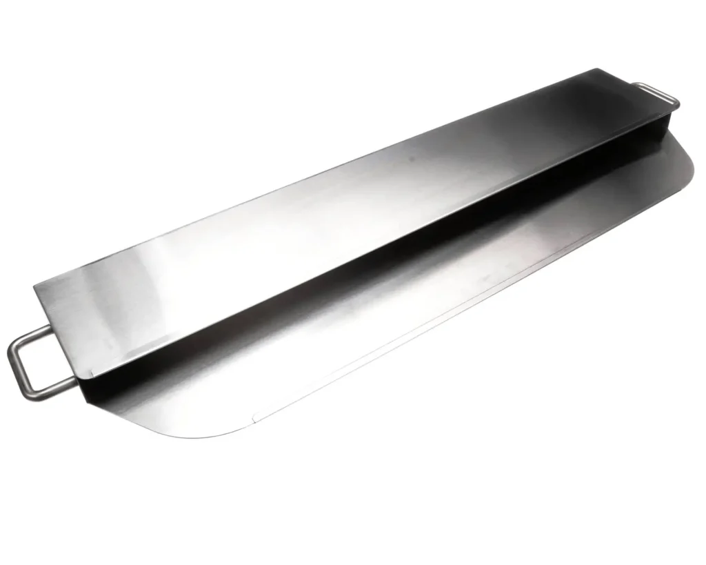 a metal spatula on a white background