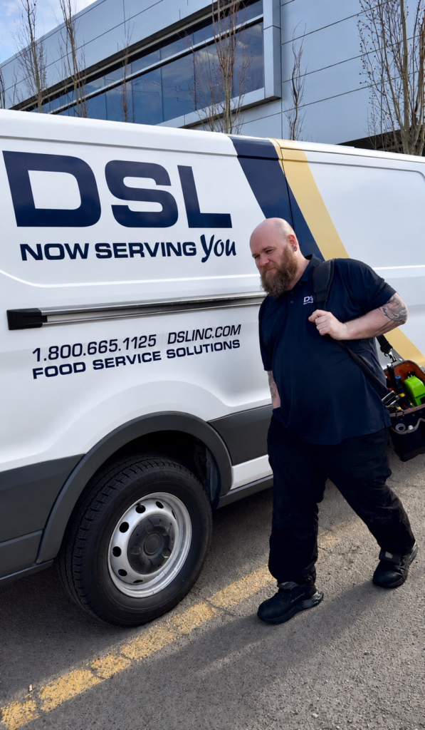DSL Technician with tools in front of DSL van