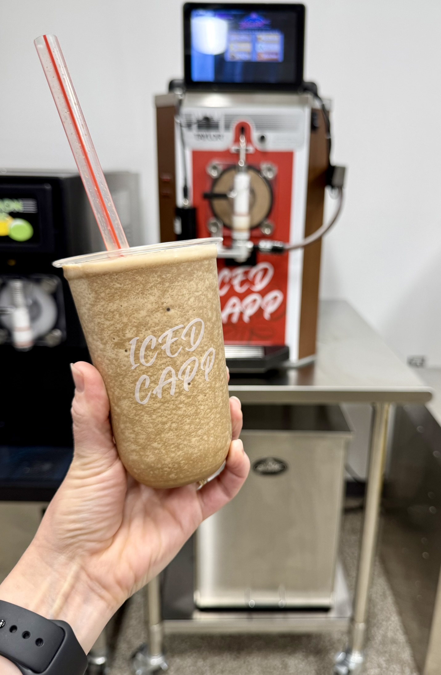 Iced cappuccino frozen beverage in front of a Taylor Model 430 FUB machine
