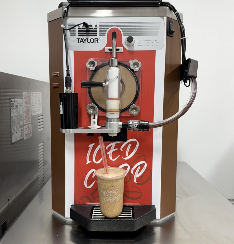 Iced Java frozen cappuccino pouring from Taylor 430 slush machine